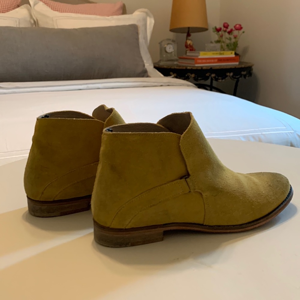 Free People distressed suede mustard color ankle boot.
